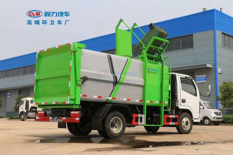 東風(fēng)多利卡D6掛桶壓縮垃圾車