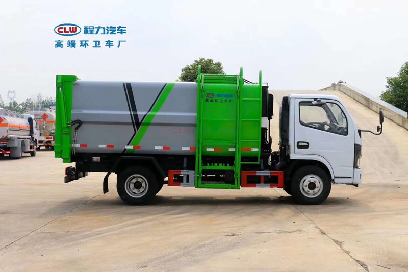 東風(fēng)多利卡D6掛桶壓縮垃圾車