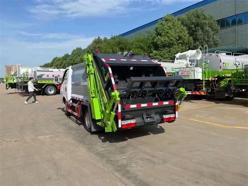 國六途逸藍(lán)牌壓縮式垃圾車可上戶